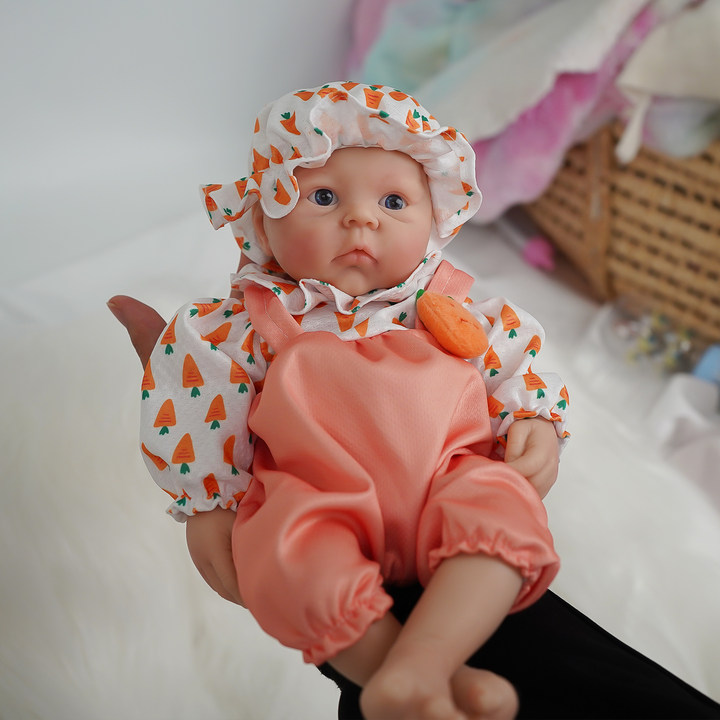 Muñeca bebé de silicona de cue - Kids Educational Songs reseña y precio